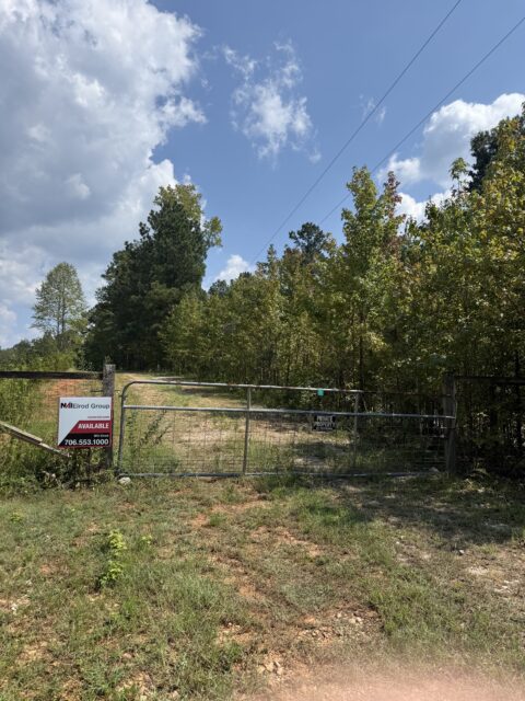 Gated entrance to 53-acre land tract for sale on Monroe Highway, Bethlehem, GA
